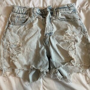 ripped and frayed jean shorts